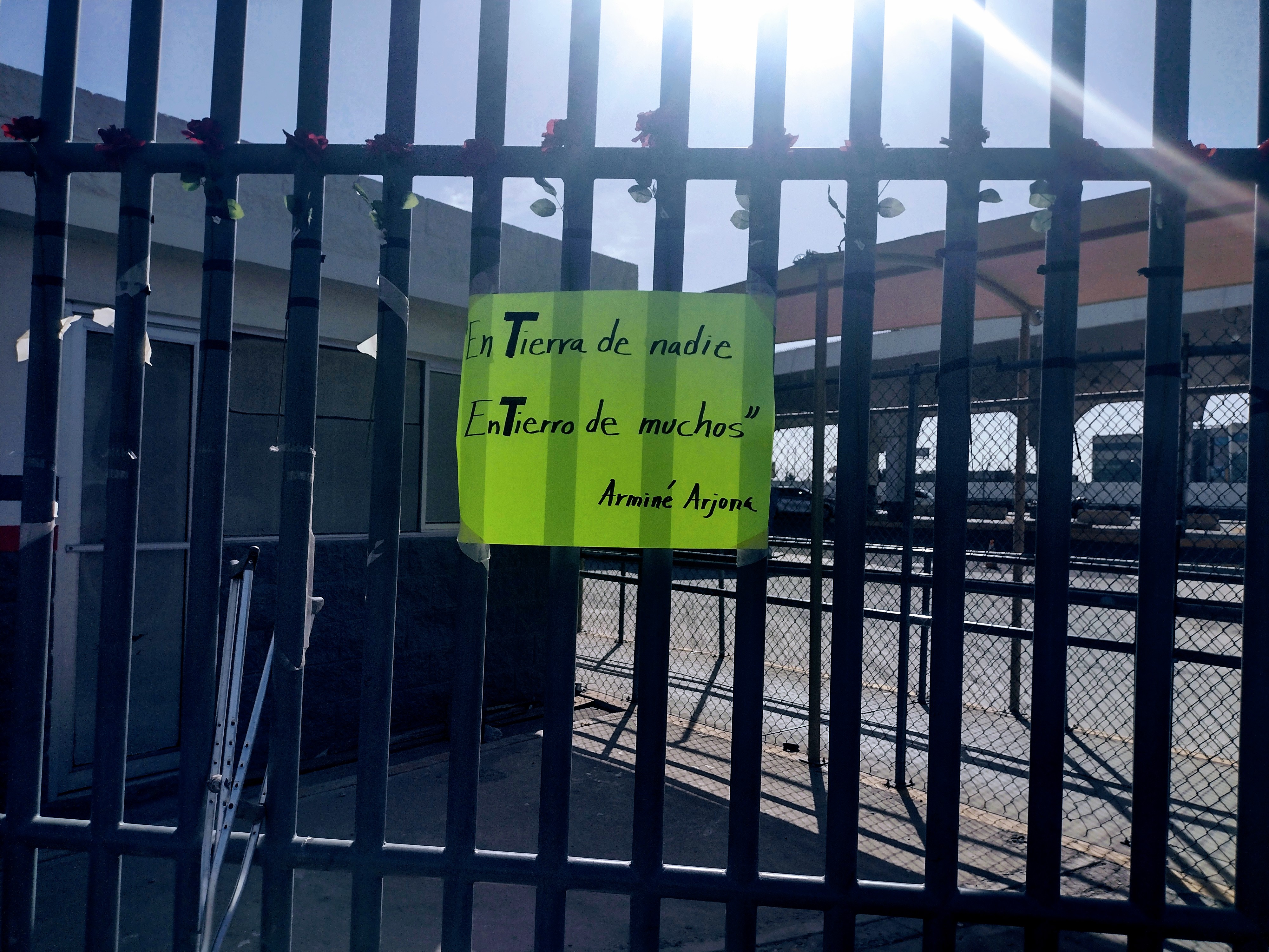 a sign at the gates of a detention centre
