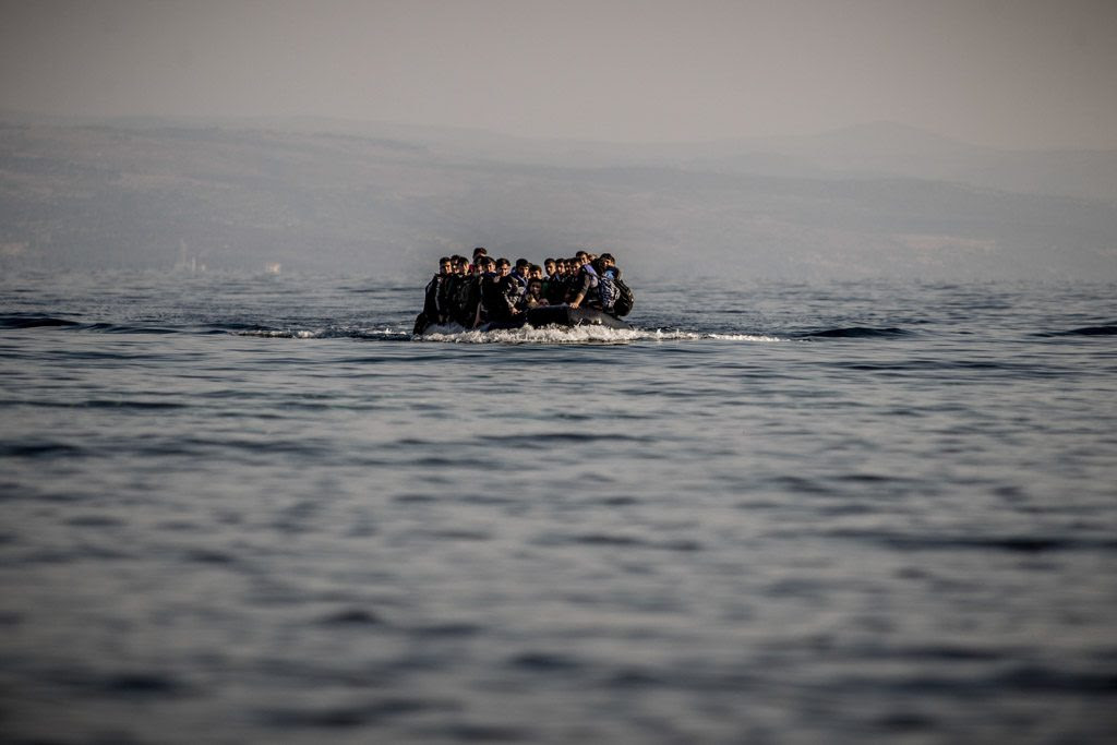 photo of people on a boat in the english channel