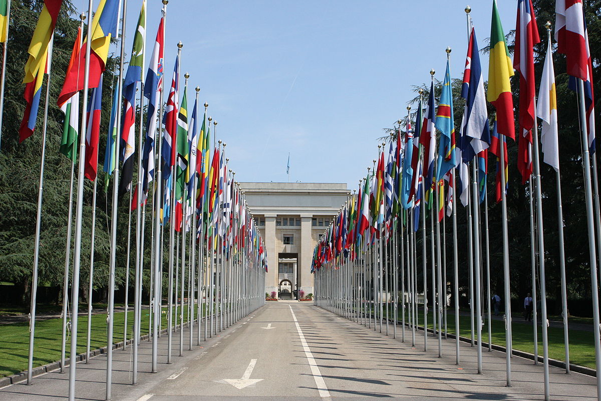 Flags of various countries fly outside the United Nations headquarters in Geneva