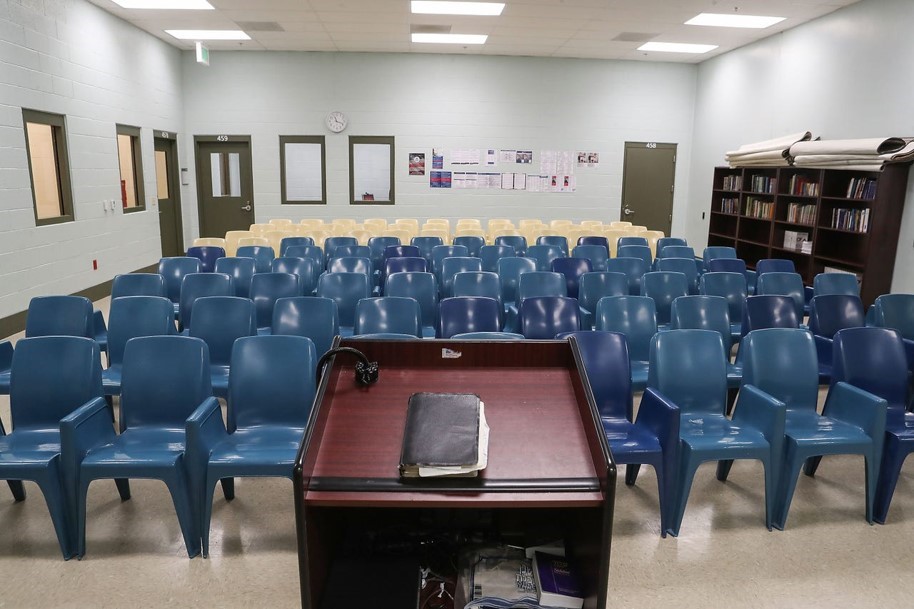 a room filled with chairs and a podium