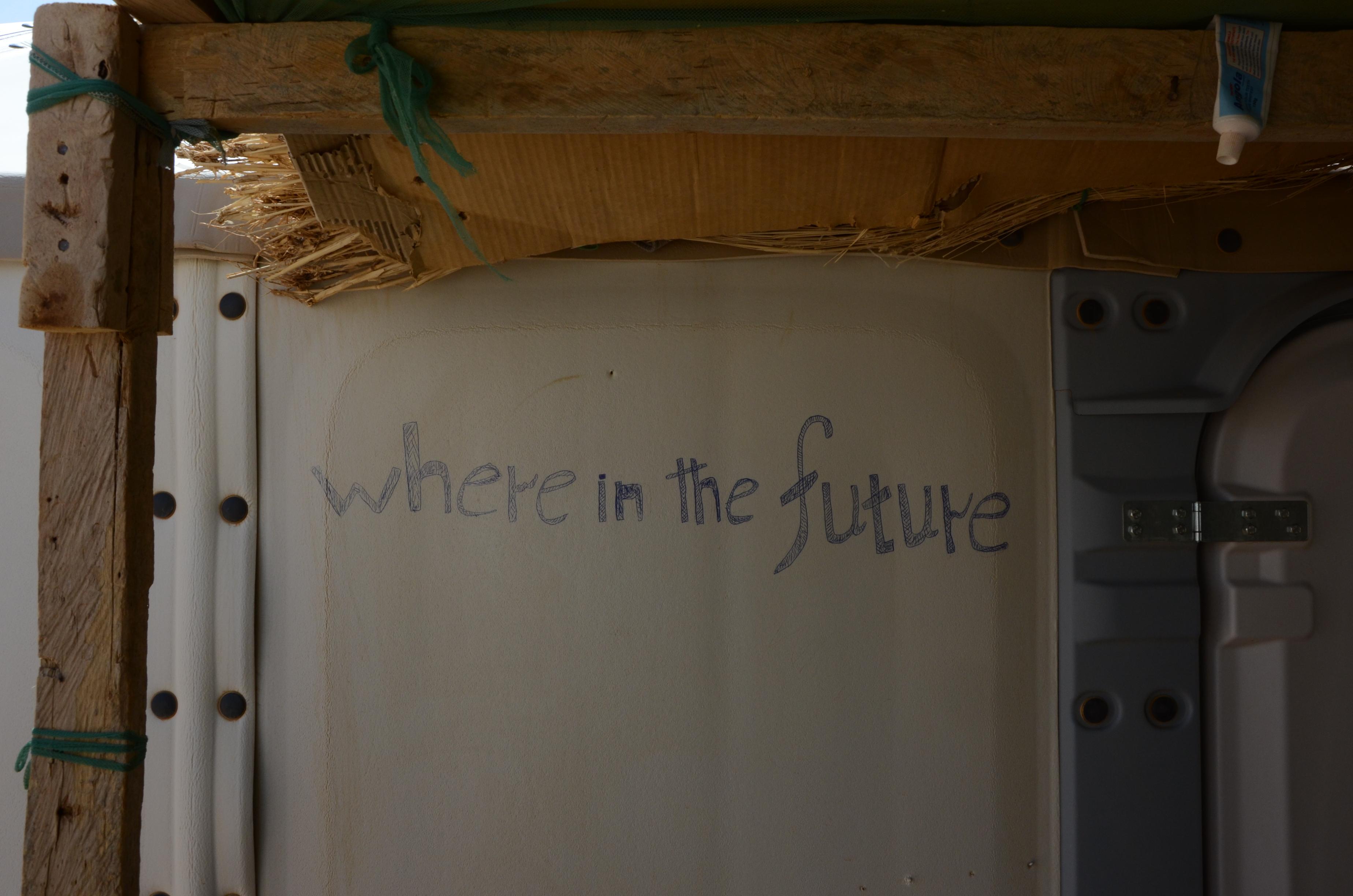 drawing on a wall saying 'where in the future' 