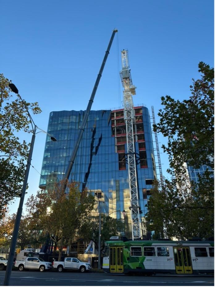 An image showing a glass high rise building under construction in Melbourne